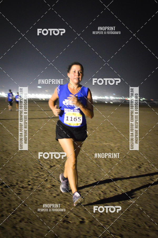 Buy your photos of the eventJovem Pan Night Run Santos on Fotop