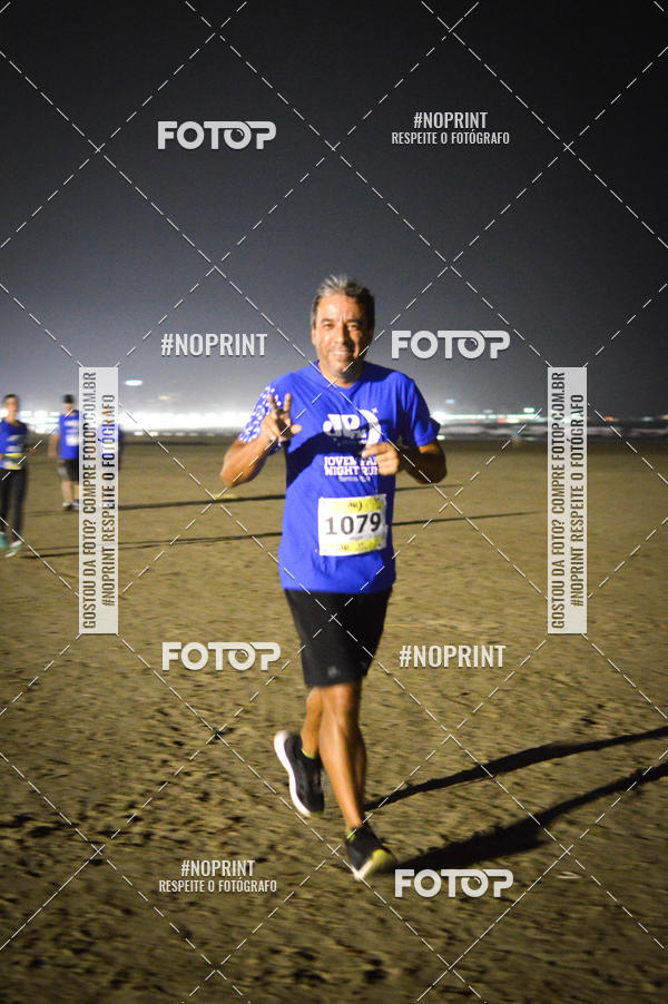 Buy your photos of the eventJovem Pan Night Run Santos on Fotop