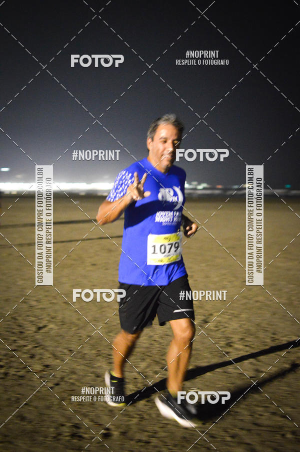 Buy your photos of the eventJovem Pan Night Run Santos on Fotop
