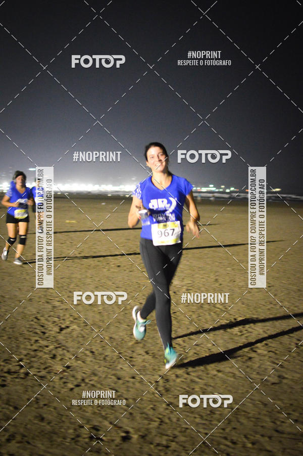 Buy your photos of the eventJovem Pan Night Run Santos on Fotop
