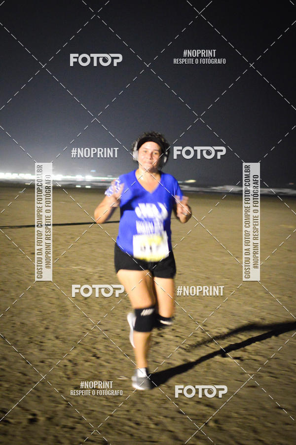 Buy your photos of the eventJovem Pan Night Run Santos on Fotop