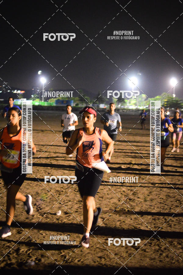 Buy your photos of the eventJovem Pan Night Run Santos on Fotop