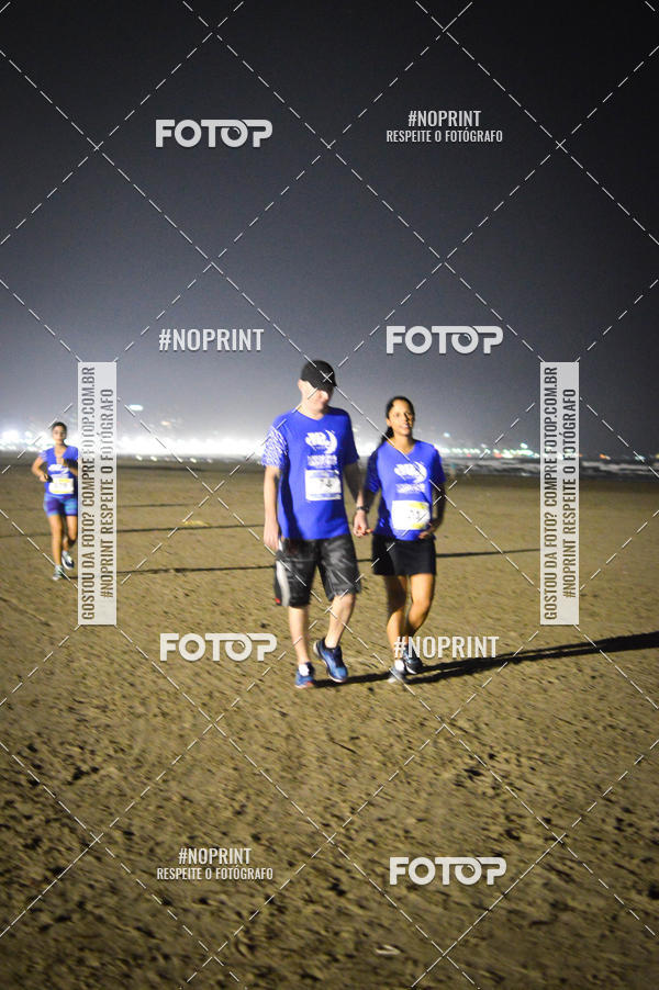 Buy your photos of the eventJovem Pan Night Run Santos on Fotop