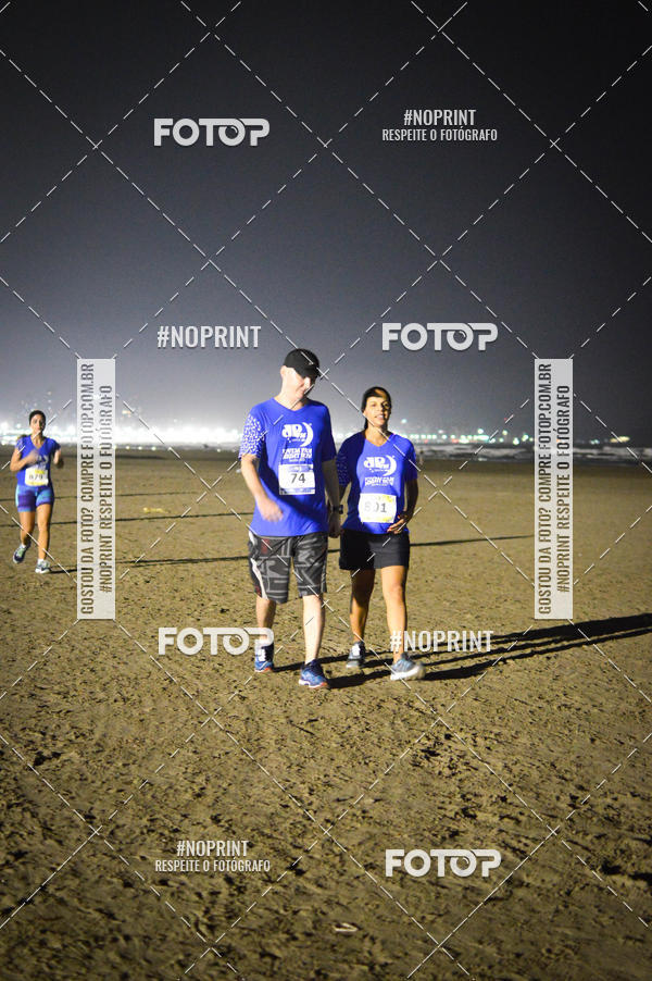 Buy your photos of the eventJovem Pan Night Run Santos on Fotop