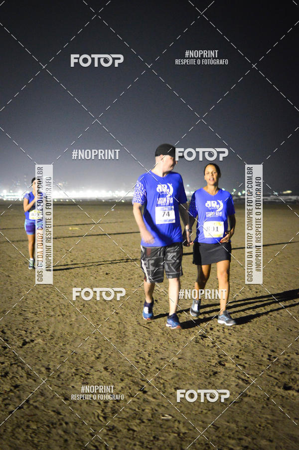 Buy your photos of the eventJovem Pan Night Run Santos on Fotop
