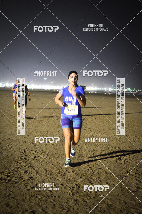 Buy your photos of the eventJovem Pan Night Run Santos on Fotop