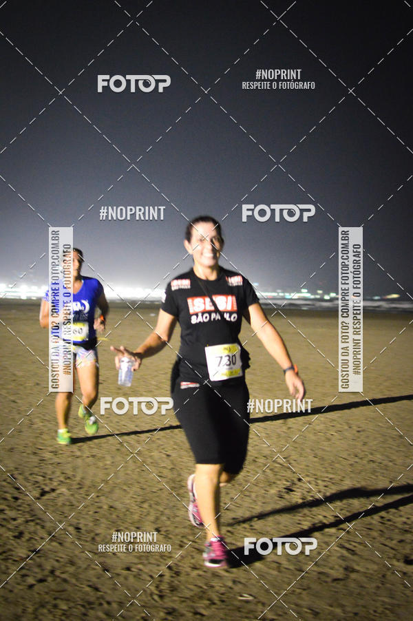 Buy your photos of the eventJovem Pan Night Run Santos on Fotop