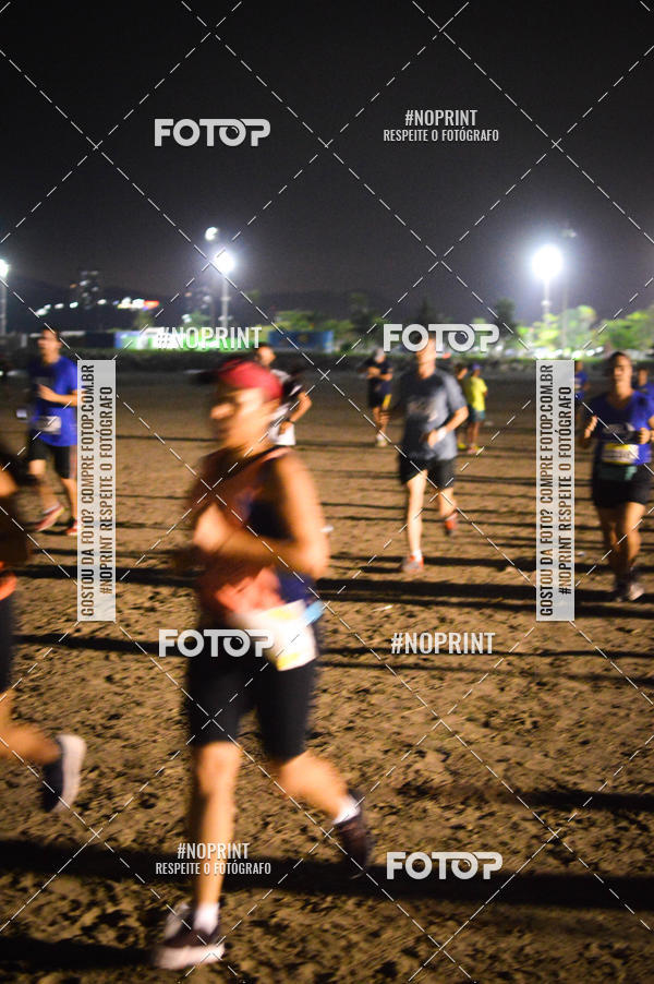 Buy your photos of the eventJovem Pan Night Run Santos on Fotop