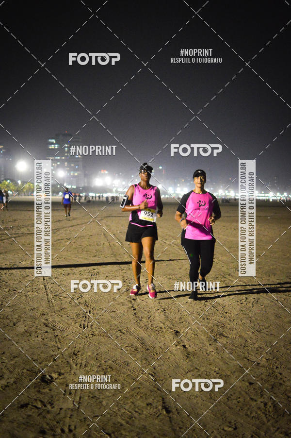 Buy your photos of the eventJovem Pan Night Run Santos on Fotop