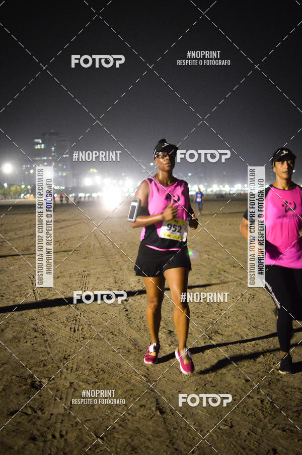 Buy your photos of the eventJovem Pan Night Run Santos on Fotop