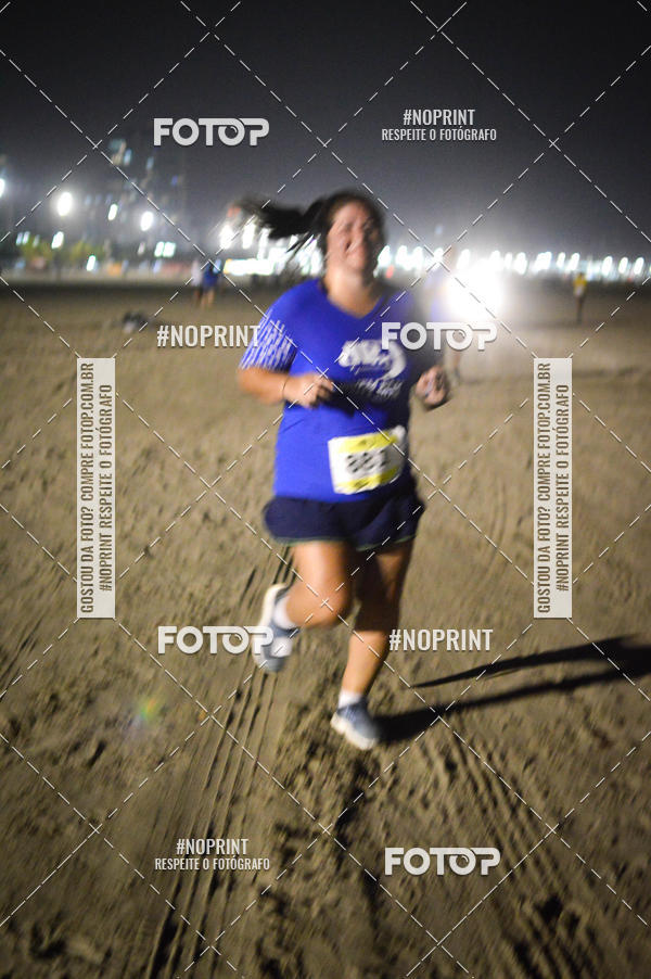 Buy your photos of the eventJovem Pan Night Run Santos on Fotop