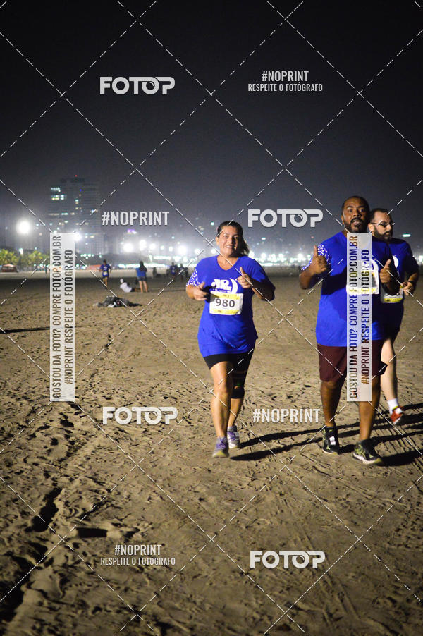 Buy your photos of the eventJovem Pan Night Run Santos on Fotop