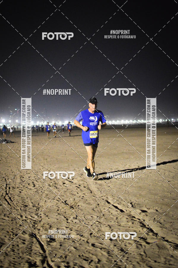 Buy your photos of the eventJovem Pan Night Run Santos on Fotop
