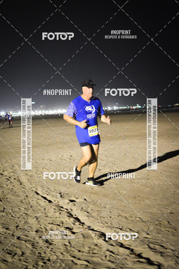 Buy your photos of the eventJovem Pan Night Run Santos on Fotop