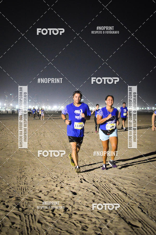 Buy your photos of the eventJovem Pan Night Run Santos on Fotop