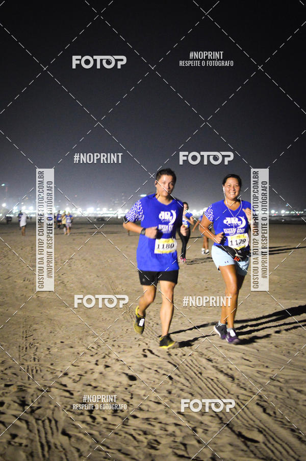 Buy your photos of the eventJovem Pan Night Run Santos on Fotop