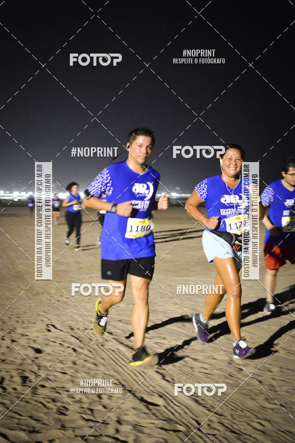 Buy your photos of the eventJovem Pan Night Run Santos on Fotop