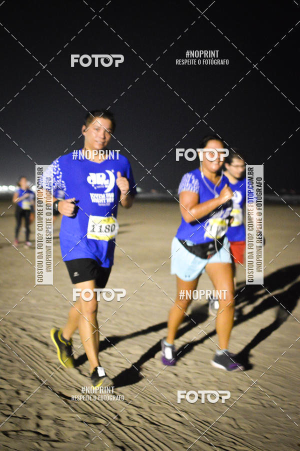 Buy your photos of the eventJovem Pan Night Run Santos on Fotop