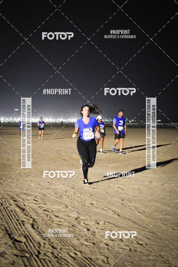 Buy your photos of the eventJovem Pan Night Run Santos on Fotop