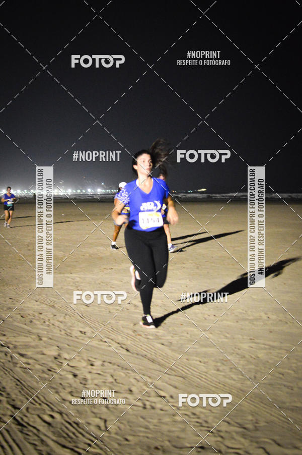 Buy your photos of the eventJovem Pan Night Run Santos on Fotop