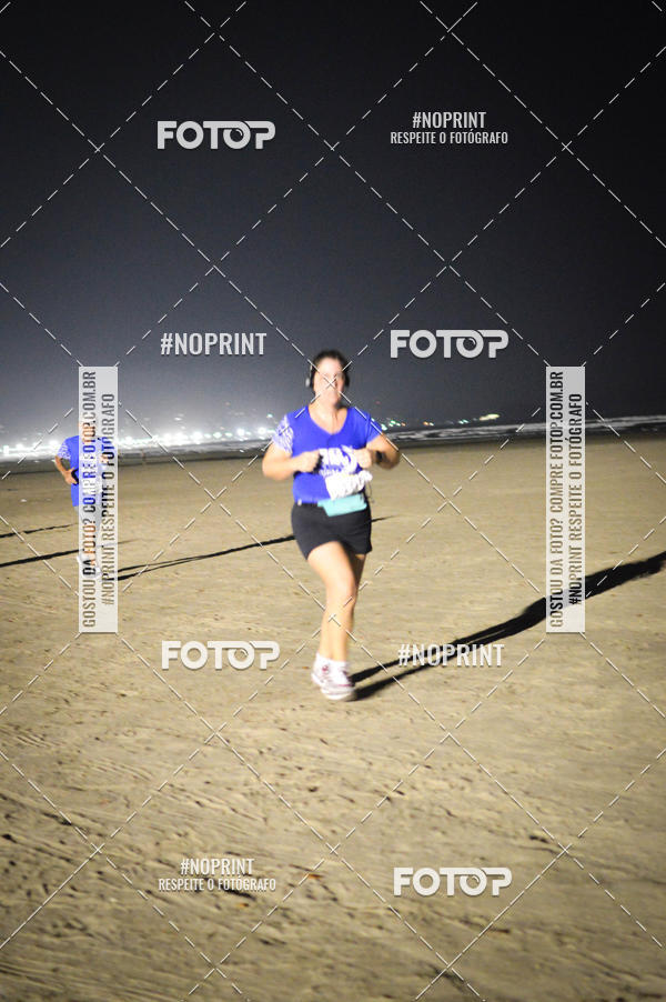 Buy your photos of the eventJovem Pan Night Run Santos on Fotop