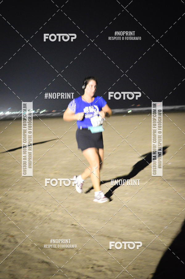 Buy your photos of the eventJovem Pan Night Run Santos on Fotop