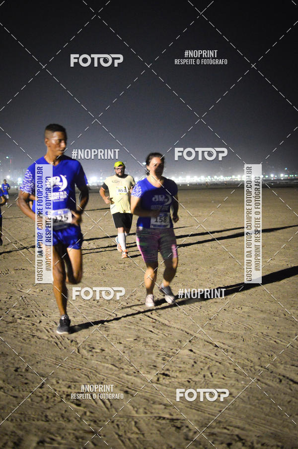 Buy your photos of the eventJovem Pan Night Run Santos on Fotop