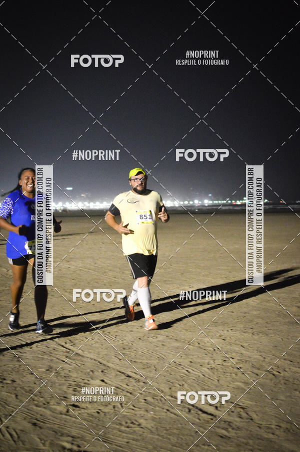 Buy your photos of the eventJovem Pan Night Run Santos on Fotop