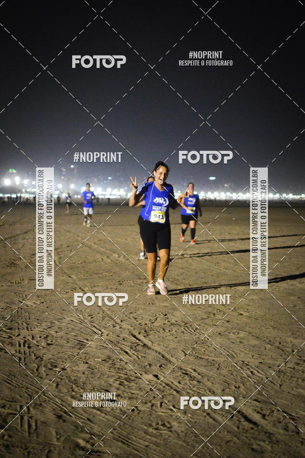 Buy your photos of the eventJovem Pan Night Run Santos on Fotop