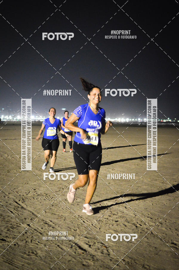 Buy your photos of the eventJovem Pan Night Run Santos on Fotop