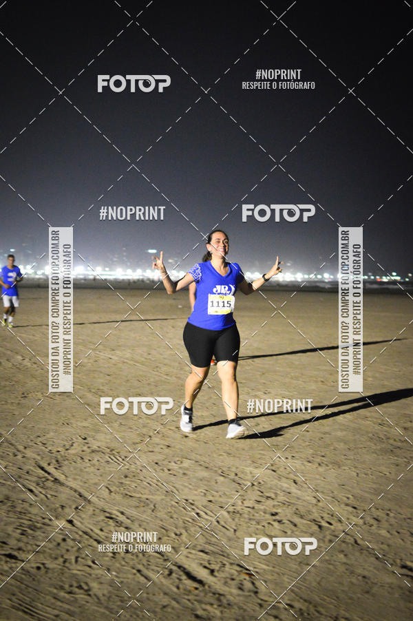 Buy your photos of the eventJovem Pan Night Run Santos on Fotop
