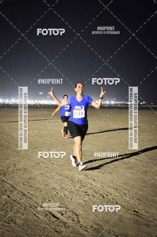 Buy your photos of the eventJovem Pan Night Run Santos on Fotop