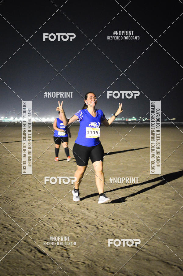 Buy your photos of the eventJovem Pan Night Run Santos on Fotop