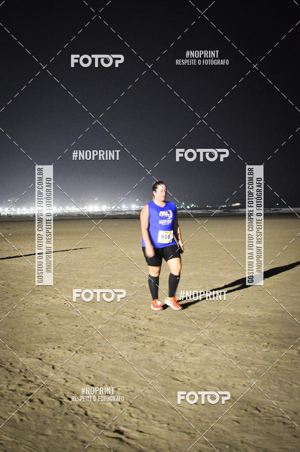 Buy your photos of the eventJovem Pan Night Run Santos on Fotop