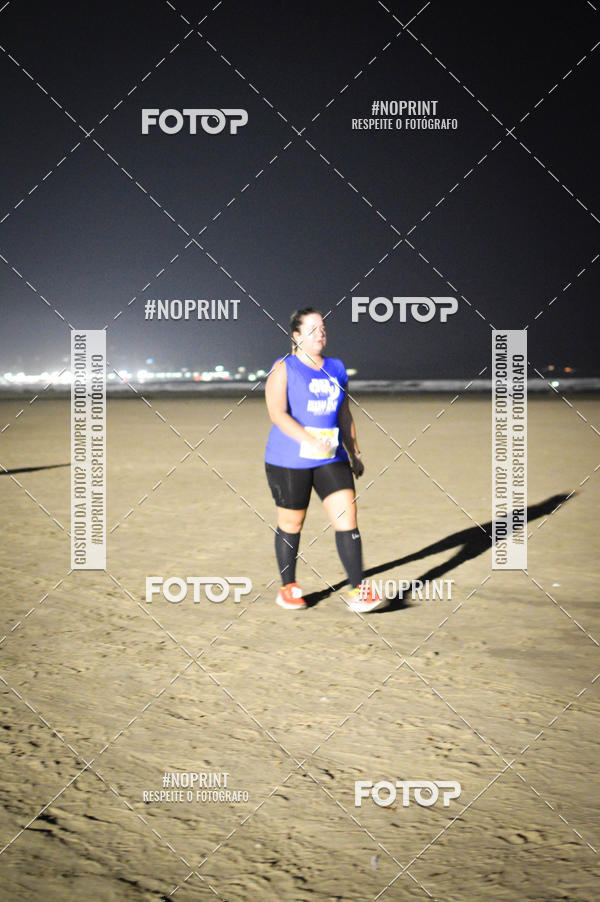 Buy your photos of the eventJovem Pan Night Run Santos on Fotop