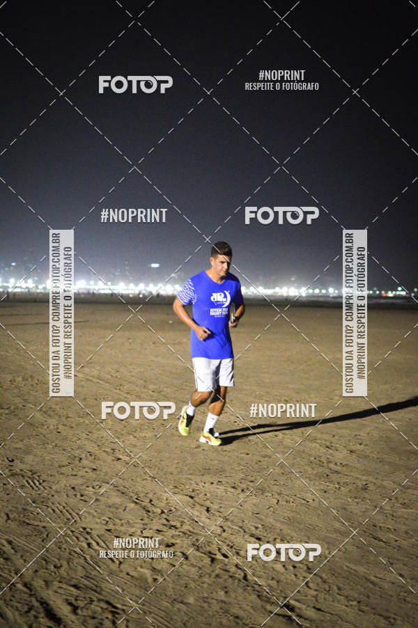 Buy your photos of the eventJovem Pan Night Run Santos on Fotop