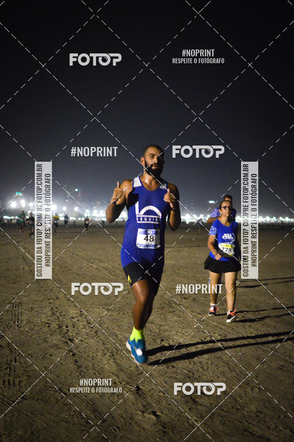 Buy your photos of the eventJovem Pan Night Run Santos on Fotop