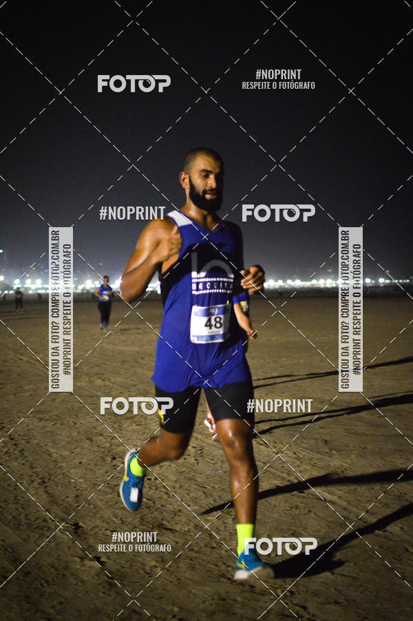 Buy your photos of the eventJovem Pan Night Run Santos on Fotop
