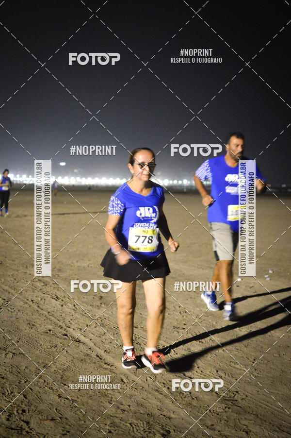 Buy your photos of the eventJovem Pan Night Run Santos on Fotop