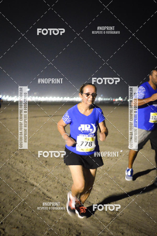 Buy your photos of the eventJovem Pan Night Run Santos on Fotop