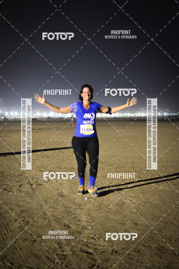 Buy your photos of the eventJovem Pan Night Run Santos on Fotop