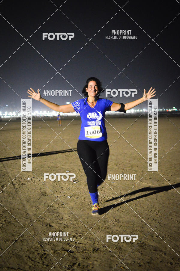 Buy your photos of the eventJovem Pan Night Run Santos on Fotop