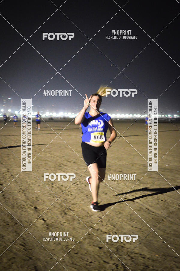 Buy your photos of the eventJovem Pan Night Run Santos on Fotop