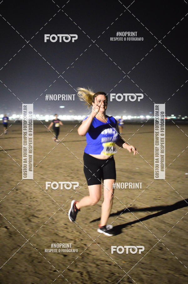 Buy your photos of the eventJovem Pan Night Run Santos on Fotop