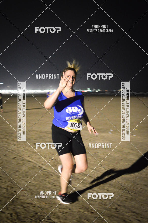 Buy your photos of the eventJovem Pan Night Run Santos on Fotop