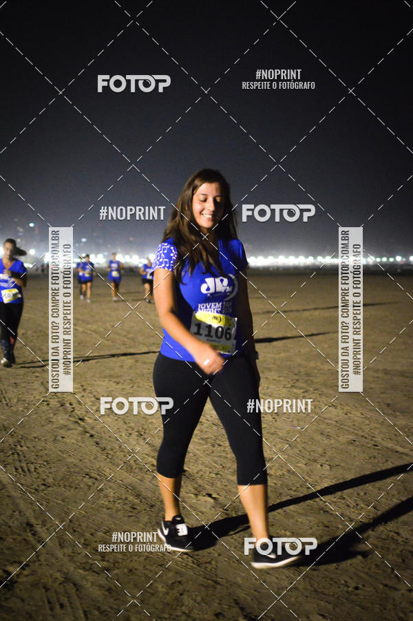 Buy your photos of the eventJovem Pan Night Run Santos on Fotop