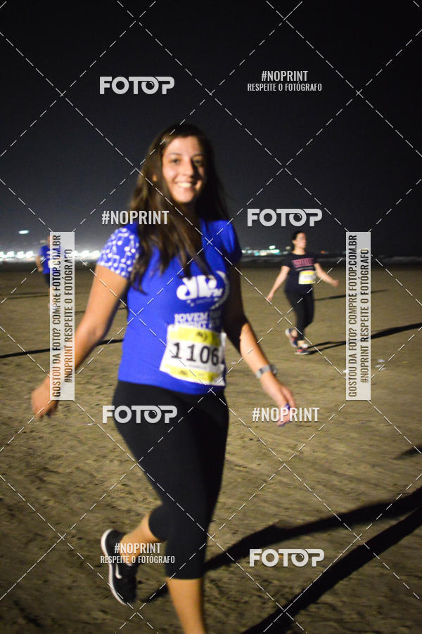 Buy your photos of the eventJovem Pan Night Run Santos on Fotop