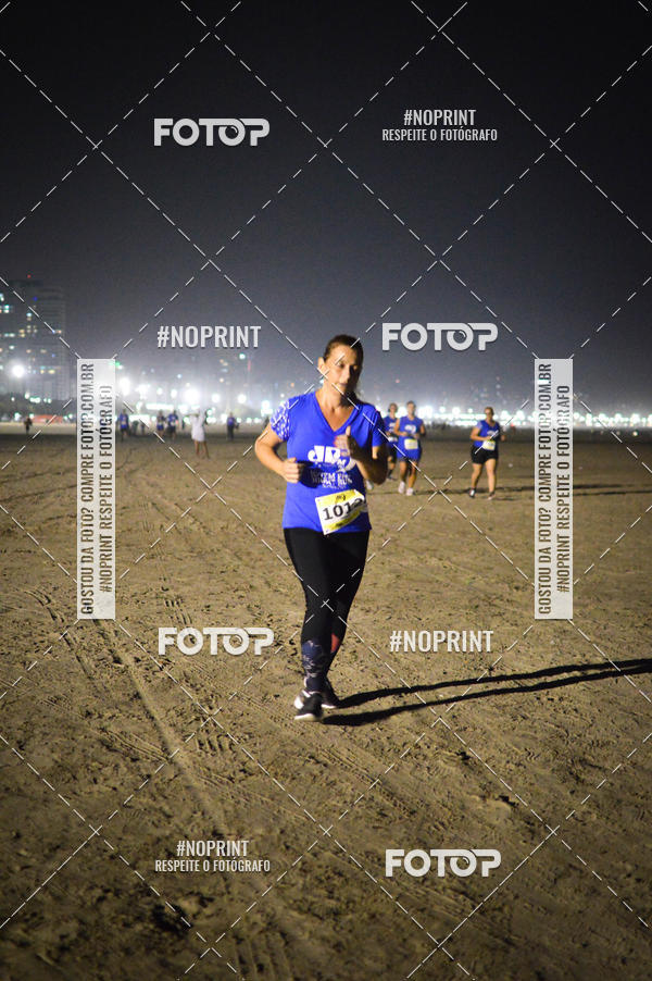 Buy your photos of the eventJovem Pan Night Run Santos on Fotop