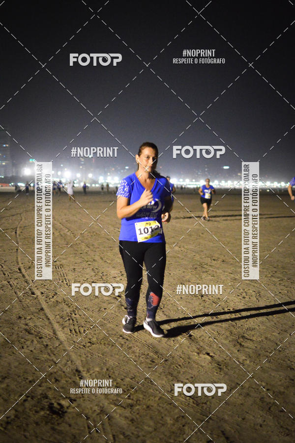 Buy your photos of the eventJovem Pan Night Run Santos on Fotop