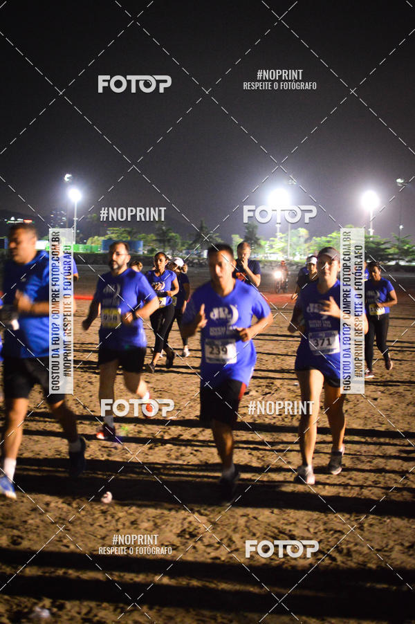 Buy your photos of the eventJovem Pan Night Run Santos on Fotop